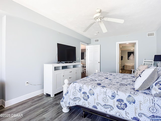 bedroom with ensuite bathroom, ceiling fan, and dark hardwood / wood-style flooring