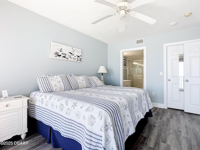 bedroom featuring ensuite bathroom, dark wood-type flooring, and ceiling fan