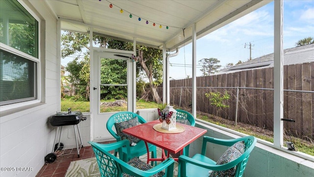 sunroom / solarium with a healthy amount of sunlight