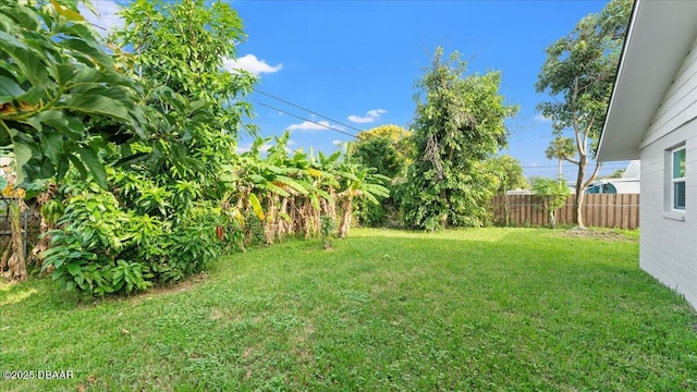 view of yard with fence