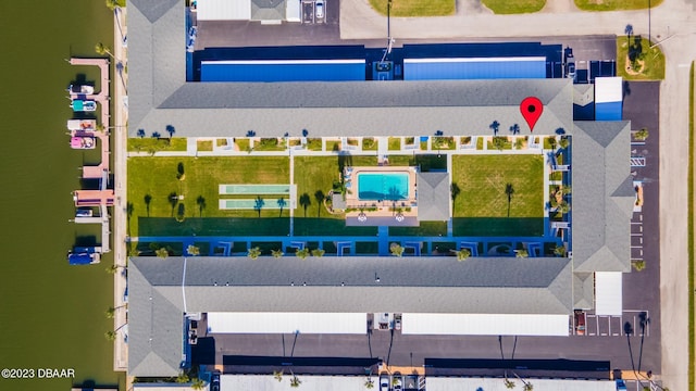 birds eye view of property featuring a water view