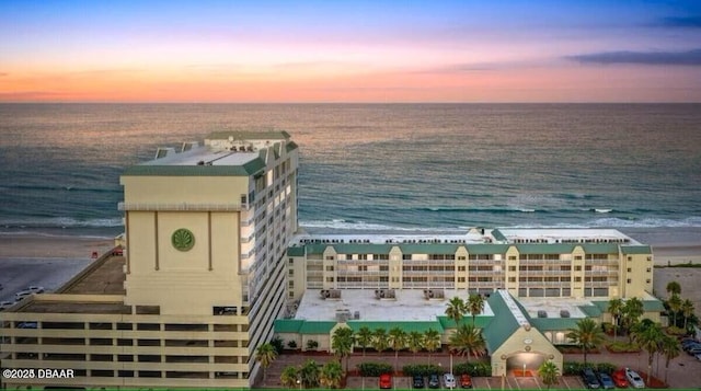 bird's eye view with a view of the beach and a water view