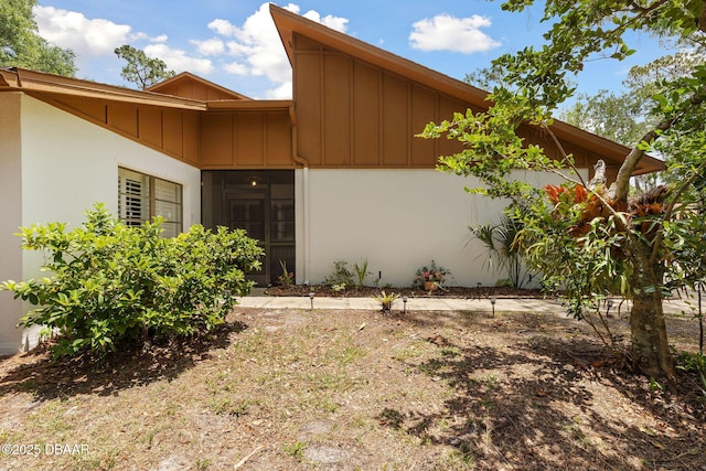 42 Soco Trl, Ormond Beach, FL 32174 - view of side of home featuring board and batten siding