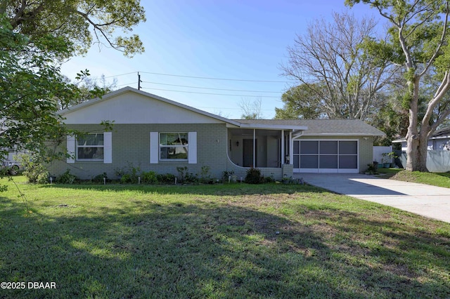 ranch-style house with a garage and a front lawn