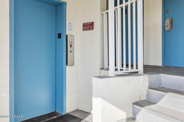 stairway with elevator