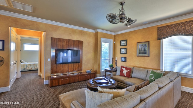 carpeted living room with ornamental molding and a healthy amount of sunlight