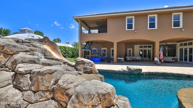 view of swimming pool with a patio area