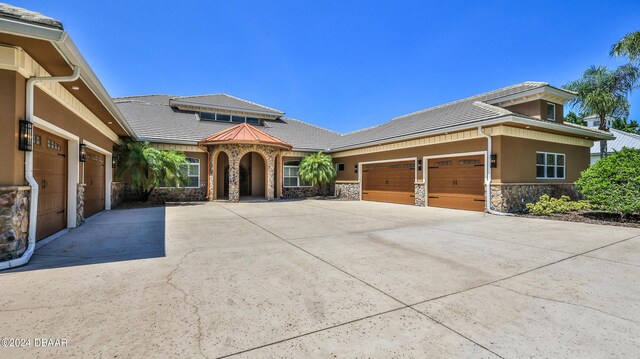 rear view of property featuring a patio