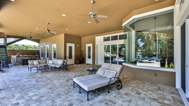 view of patio with ceiling fan