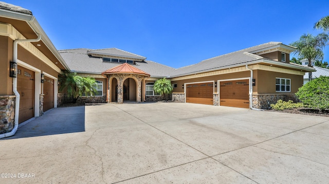 view of front of property featuring a garage