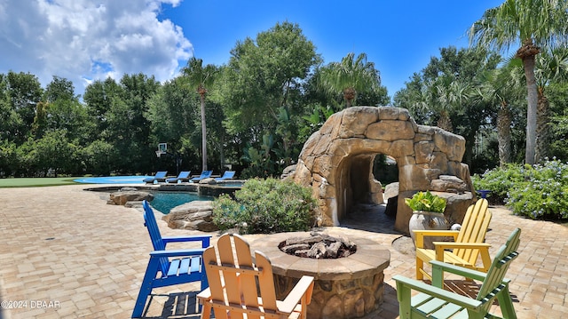 view of patio / terrace featuring a fire pit