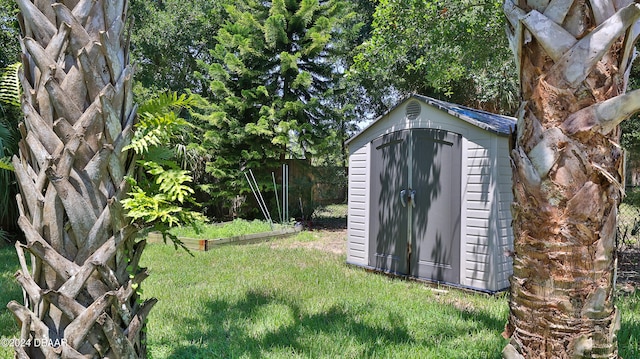 view of outdoor structure with a lawn