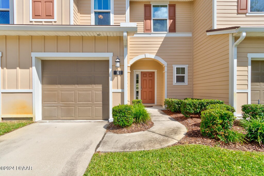 property entrance featuring a garage