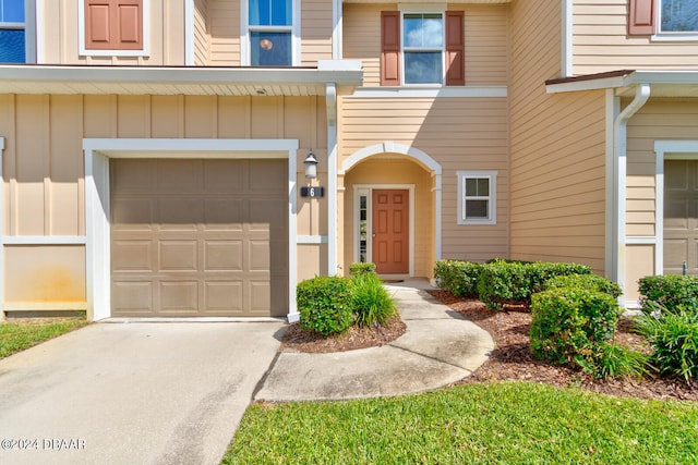 property entrance featuring a garage