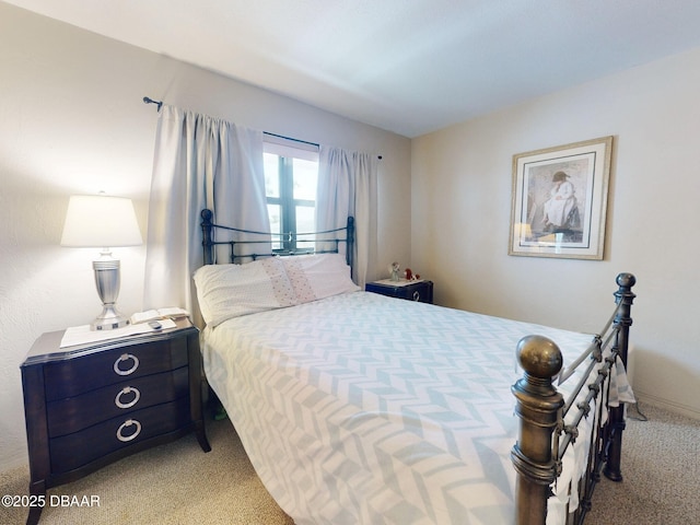 bedroom featuring carpet