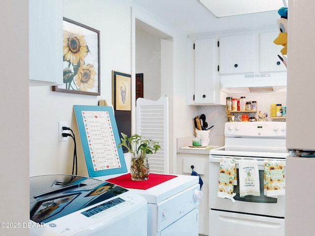 washroom featuring laundry area and washer and dryer