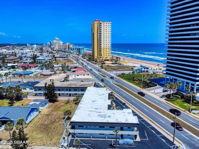 aerial view featuring a water view and a city view