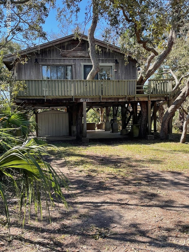 view of front of house with a wooden deck