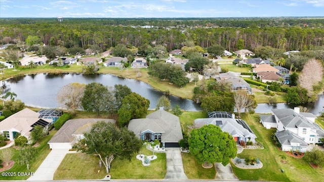 aerial view with a residential view and a water view