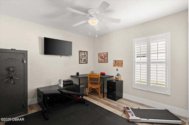 1589 Town Park Dr, Port Orange, FL 32129 - exercise room with ceiling fan and hardwood / wood-style floors