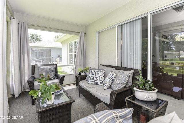 sunroom / solarium featuring plenty of natural light