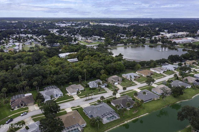 aerial view with a residential view and a water view