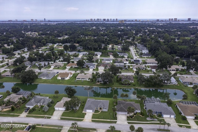 aerial view featuring a residential view and a water view