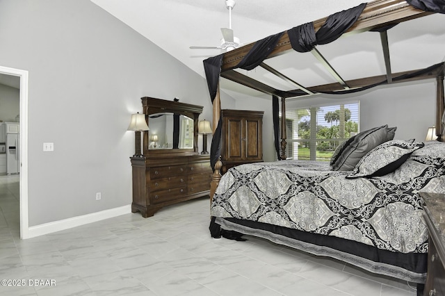 bedroom featuring washer / dryer, ceiling fan, baseboards, and lofted ceiling