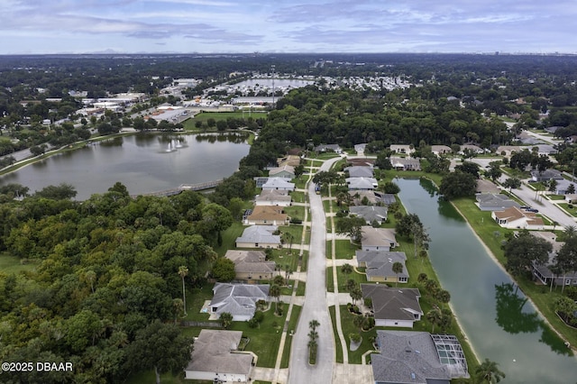 bird's eye view with a residential view and a water view