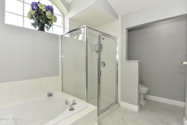 full bathroom featuring toilet, marble finish floor, a stall shower, baseboards, and a bath