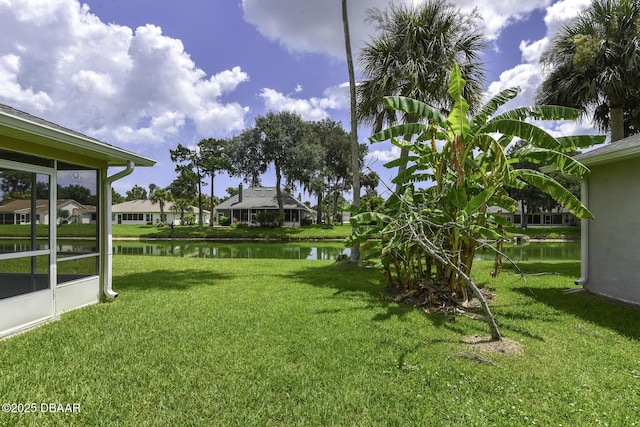 view of yard with a water view