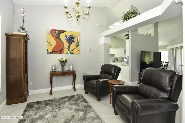 sitting room featuring a notable chandelier, marble finish floor, high vaulted ceiling, and baseboards