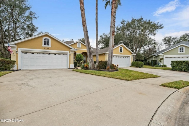 single story home with a front lawn