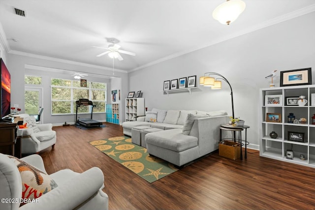 living room featuring ceiling fan, crown molding, and dark hardwood / wood-style floors