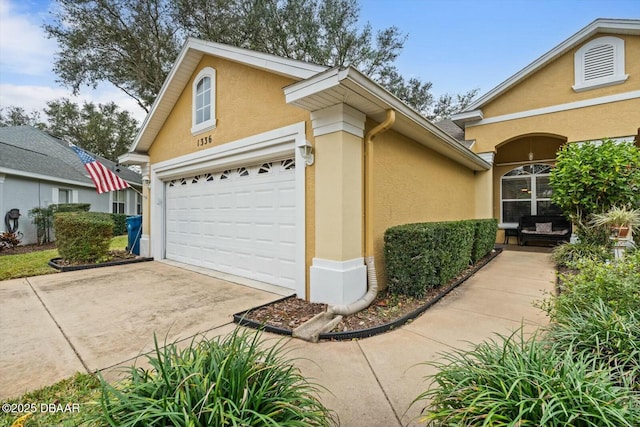 view of side of property with a garage