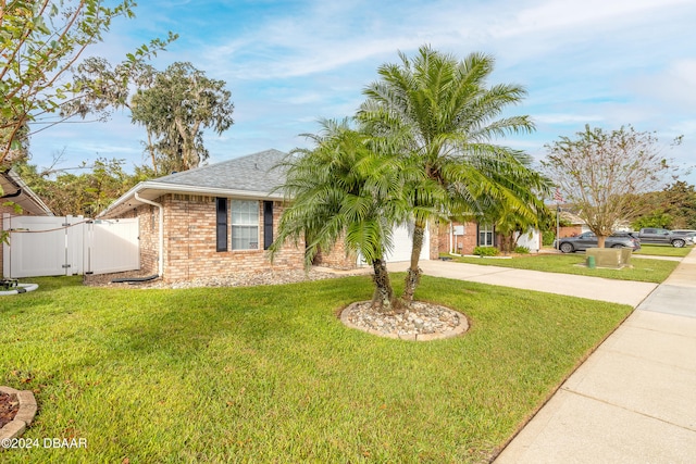 view of front of property with a front lawn