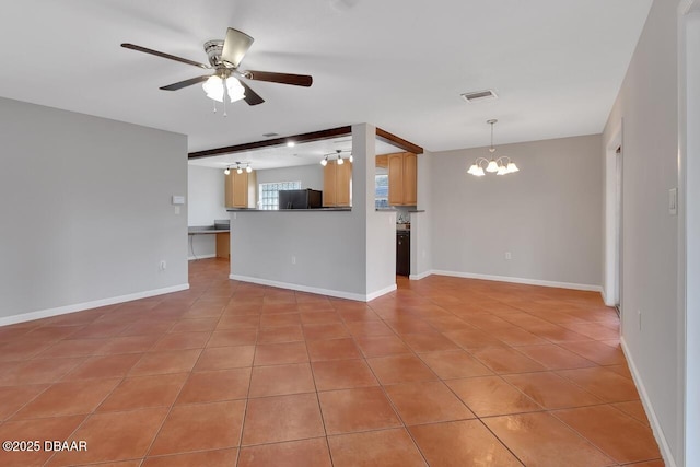 unfurnished living room featuring light tile patterned floors, baseboards, and ceiling fan with notable chandelier