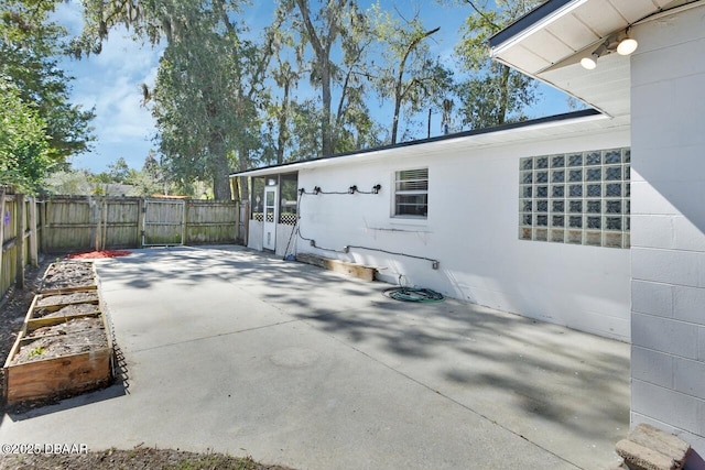 view of patio / terrace with fence