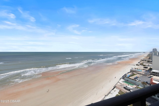 view of water feature with a beach view