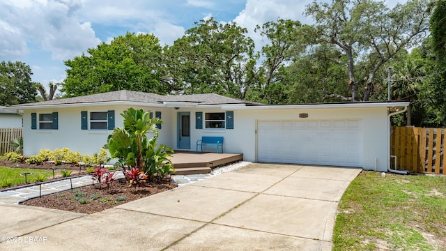 556 N Beach St, Ormond Beach, FL 32174 - ranch-style home featuring concrete driveway and an attached garage