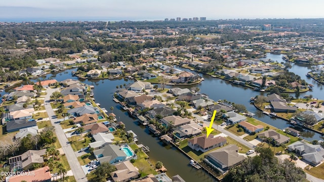 drone / aerial view with a water view