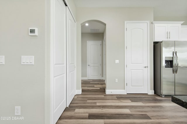 hallway featuring hardwood / wood-style floors