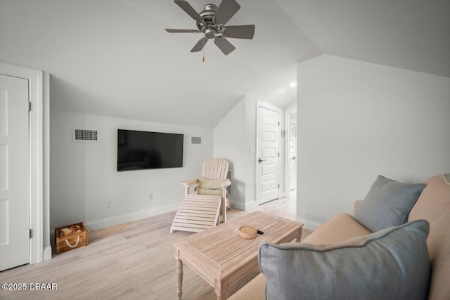 96 Grove St, Ormond Beach, FL 32174 - living area with lofted ceiling, a ceiling fan, light wood-style flooring, and baseboards