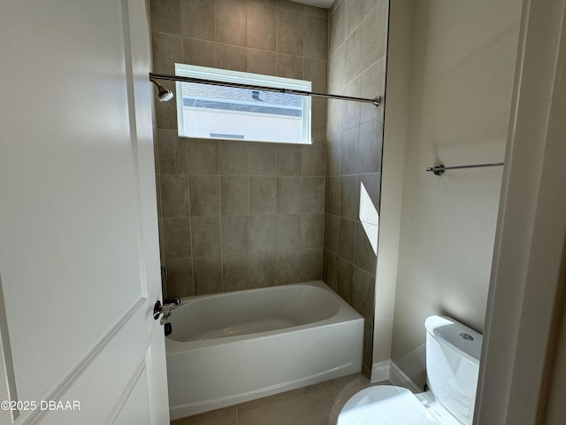 full bathroom featuring toilet, shower / bathtub combination, and tile patterned flooring