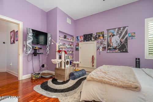 bedroom featuring hardwood / wood-style flooring