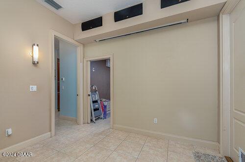 interior space featuring light tile patterned floors