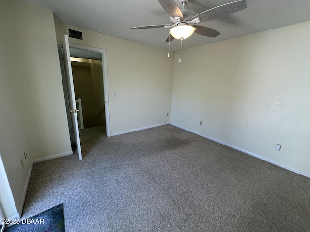 4150 S Atlantic Ave Unit 102B, New Smyrna Beach, FL 32169 - unfurnished bedroom with carpet and ceiling fan