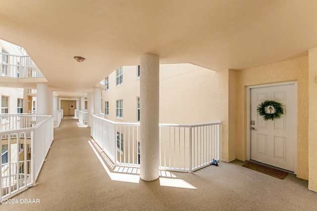 doorway to property featuring a balcony