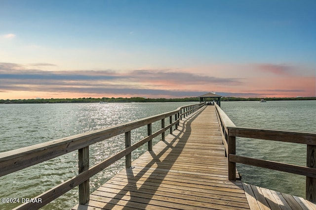 view of dock with a water view