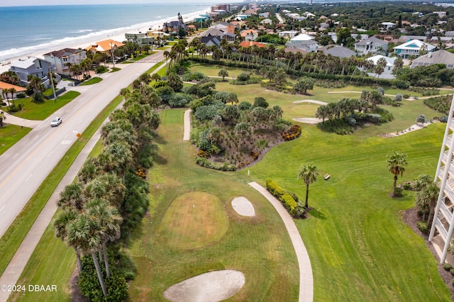 aerial view with a water view and a view of the beach